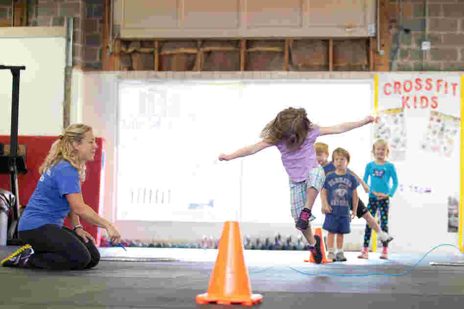 The CrossFit class for kids in Rockville, Md., includes an exercise called "jump the snake." Tavi Decker, 4, demonstrates.