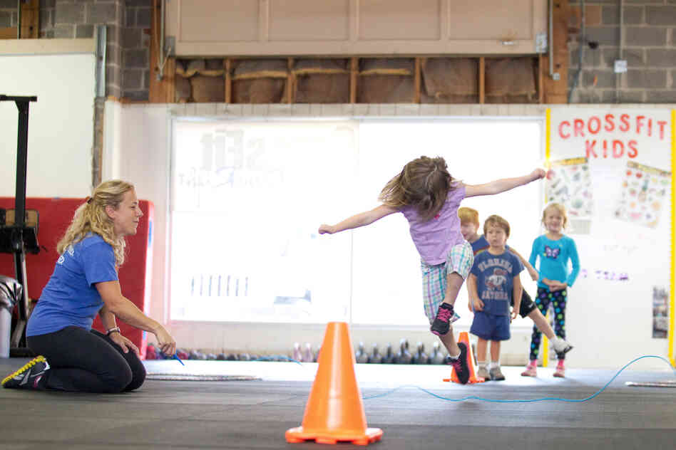 The CrossFit class for kids in Rockville, Md., includes an exercise called "jump the snake." Tavi Decker, 4, demonstrates.