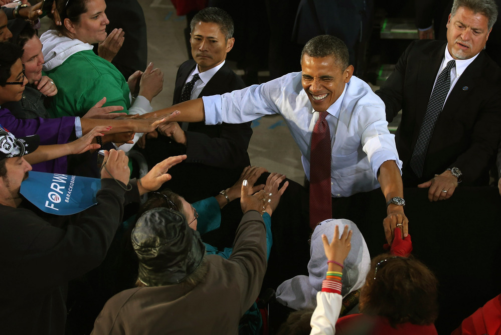 President Obama greets supporters during a campaign rally on Saturday in Milwaukee.