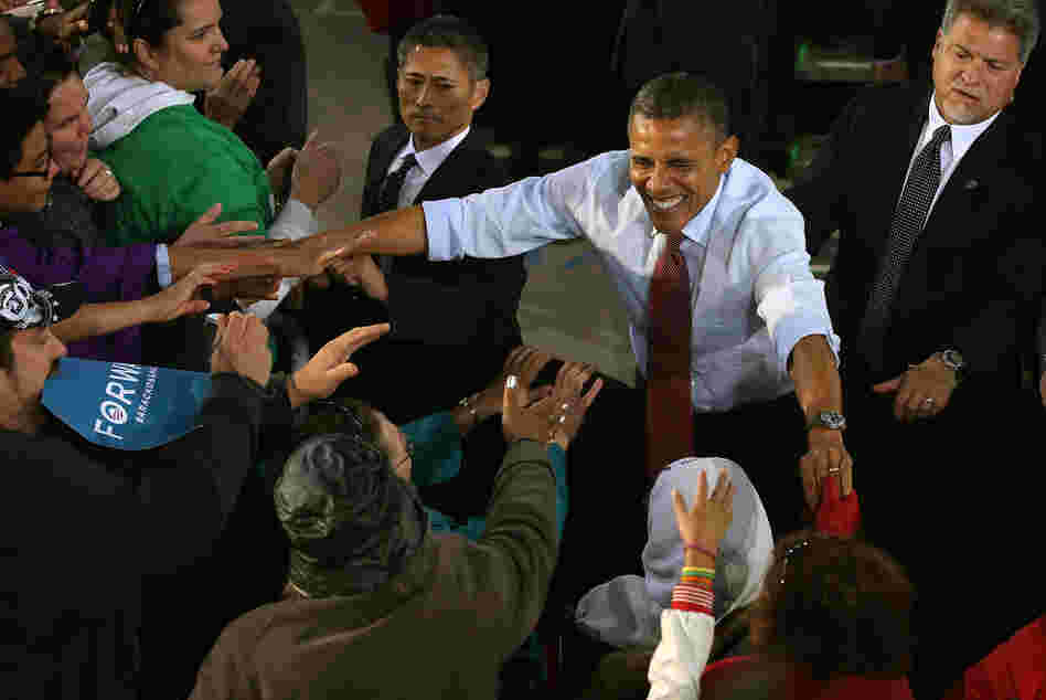 President Obama greets supporters during a campaign rally on Saturday in Milwaukee.