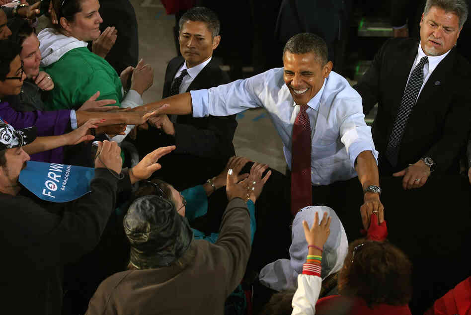President Obama greets supporters during a campaign rally on Saturday in Milwaukee.