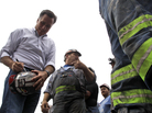 Republican presidential candidate Mitt Romney autographs a coal miner's hat during a campaign event Aug. 14 at American Energy Corp. in Beallsville, Ohio. Republican presidential candidate Mitt Romney autographs a coal miner's hat during a campaign event Aug. 14 at American Energy Corp. in Beallsville, Ohio.