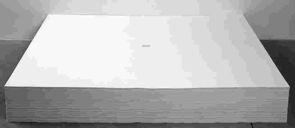 Felix Gonzalez-Torres' untitled 1991 work consists of a stack of papers, each with a tiny excerpt from The New York Times printed in the center. Visitors are invited to take a piece of paper from the work home with them. Felix Gonzalez-Torres' untitled 1991 work consists of a stack of papers, each with a tiny excerpt from The New York Times printed in the center. Visitors are invited to take a piece of paper from the work home with them.
