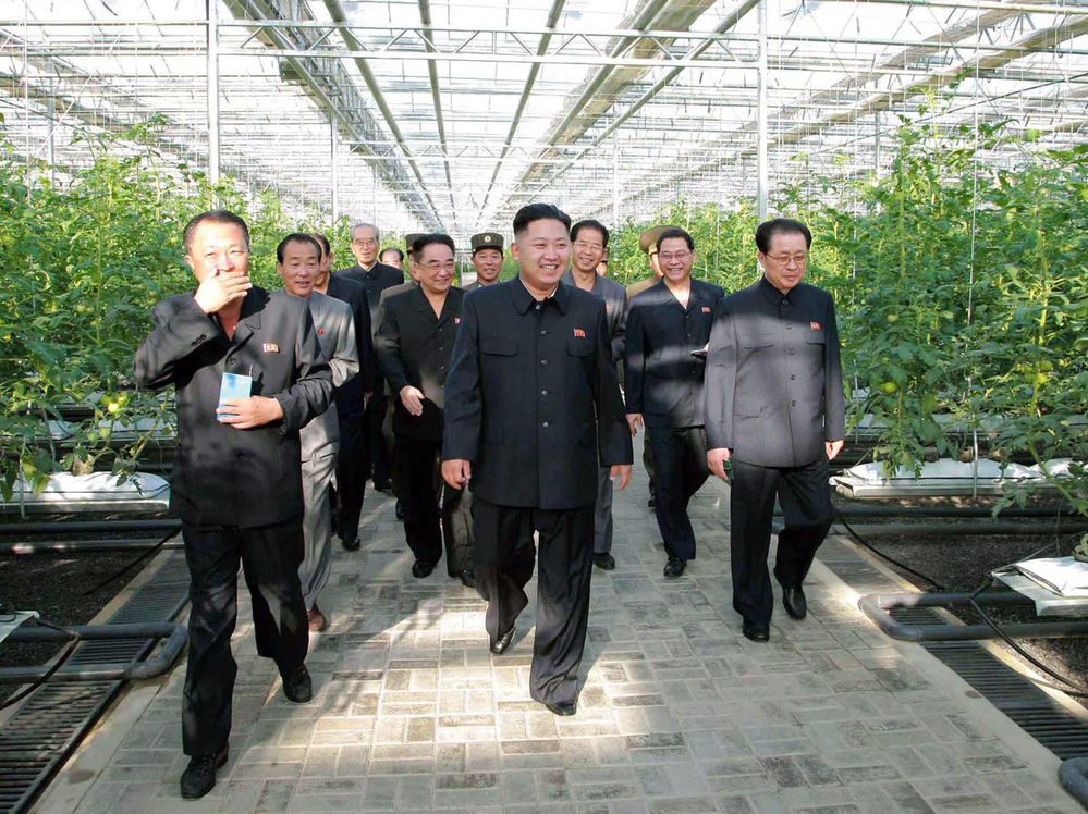 North Korean leader Kim Jong Un (center) visits the Pyongyang Vegetable Science Institute in the country's capital in this undated picture released by North Korea's official Korean Central News Agency (KCNA) via the Korean News Service on Sept. 22.