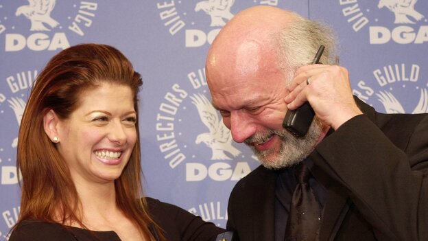 In a 2001 photo, actress Debra Messing and director James Burrows pose together after Burrows won a Directors Guild of America award for directing the pilot of Will & Grace.
