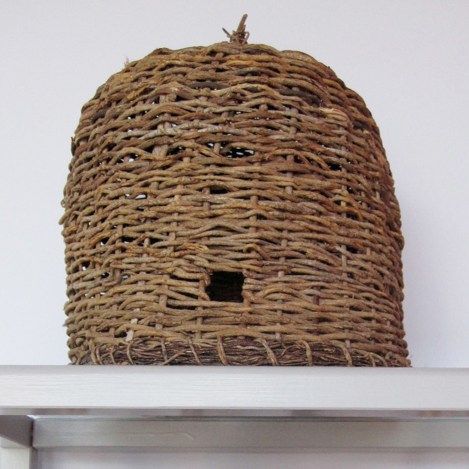 An ancient beehive sits on a shelf at Maine Mead Works meadery in Portland, Me.