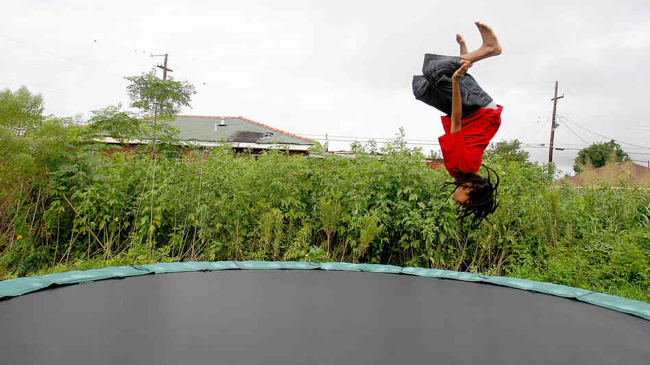 Eric Wiltz cavorts on a  trampoline in New Orleans in  2010. Everything is fun and games on the backyard attractions until someone gets hurt, a leading group of pediatricians says.