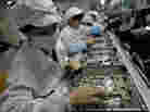 Workers at a Foxconn plant in Shenzhen, China, in 2010.