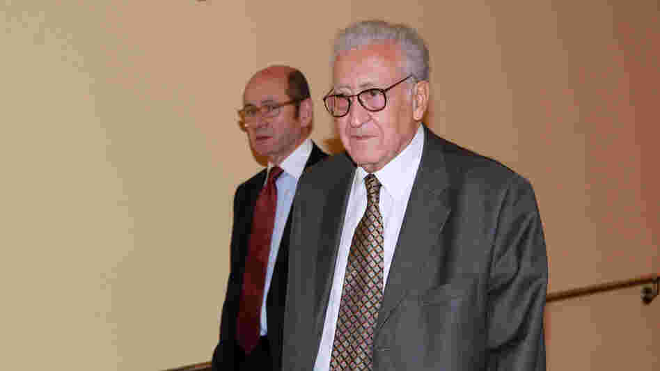 Lakhdar Brahimi, right, joint special representative for Syria, arrives at closed door consultations regarding the situation in Syria at the Security Council at United Nations headquarters on Monday.