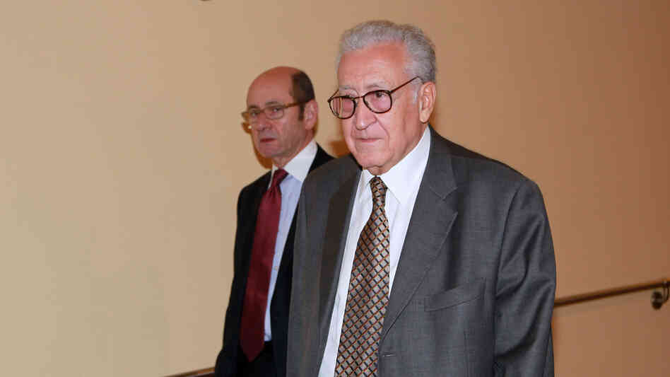 Lakhdar Brahimi, right, joint special representative for Syria, arrives at closed door consultations regarding the situation in Syria at the Security Council at United Nations headquarters on Monday.