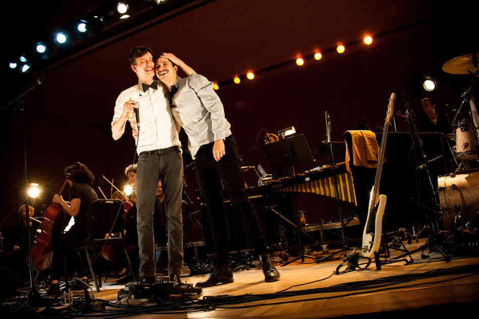 Efterklang's Mads Brauer and Casper Clausen celebrate at the end of the show.