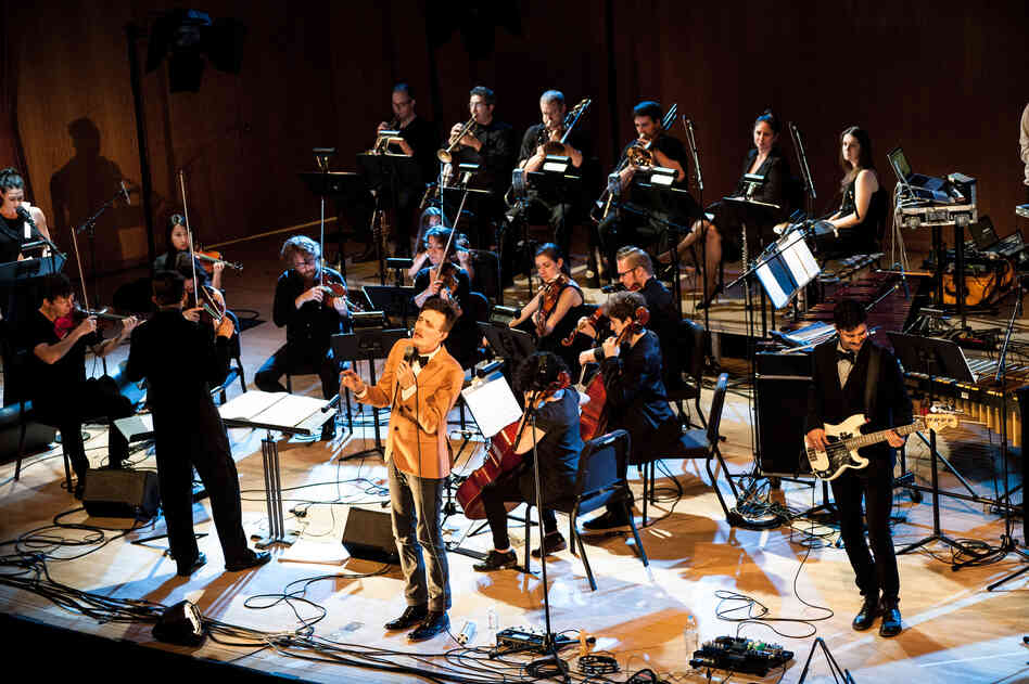 Guest conductor Matthew Coorey leads the sixteen-member Wordless Music Orchestra.