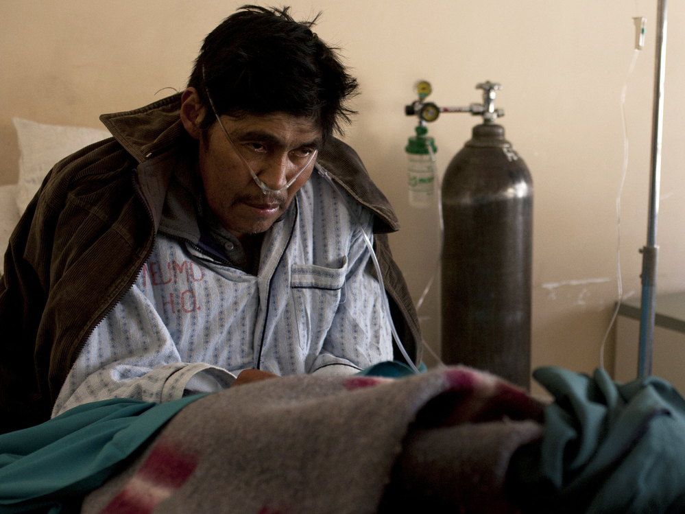 Saturnino Soncko, 58, has been inhaling the fine dust at the silver mines of Cerro Rico for years. He is now extremely ill, gasping for breath in the pulmonary wing of a public hospital in Potosi, Bolivia.