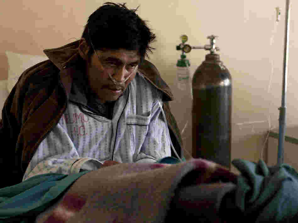 Saturnino Soncko, 58, has been inhaling the fine dust at the silver mines of Cerro Rico for years. He is now extremely ill, gasping for breath in the pulmonary wing of a public hospital in Potosi, Bolivia.