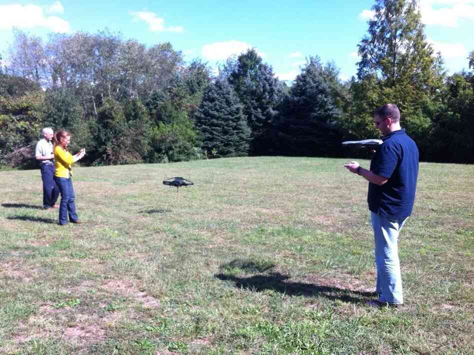 Alice Beauheim, her father and Bill Love fly their homemade machines at the Drone Smackdown in Manassas, Va., on Sunday. Objections by the Federal Aviation Administration forced organizers to hold the tongue-in-cheek contest outside of Washington, D.C.