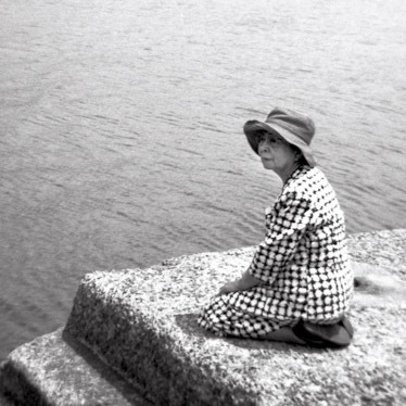 Emi Taniguchi is pictured near the factory she was working at when the atom bomb exploded in Nagasaki, Japan.