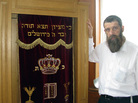 Dovid Karpov has been the rabbi at the Darkei Shalom synagogue since it was built 15 years ago. Like many people in his congregation, Karpov grew up in a Soviet-era family that was not religious. He says he had to learn his faith for himself. Dovid Karpov has been the rabbi at the Darkei Shalom synagogue since it was built 15 years ago. Like many people in his congregation, Karpov grew up in a Soviet-era family that was not religious. He says he had to learn his faith for himself.