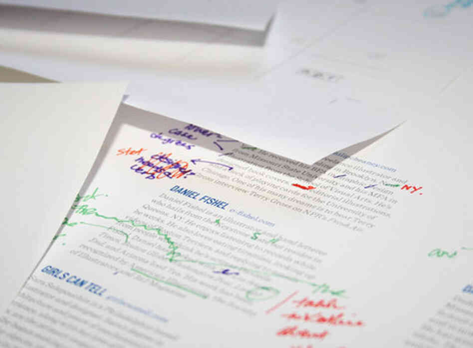 Each editor takes a different color pen and goes to town marking up the calendar's draft pages. Each editor takes a different color pen and goes to town marking up the calendar's draft pages.