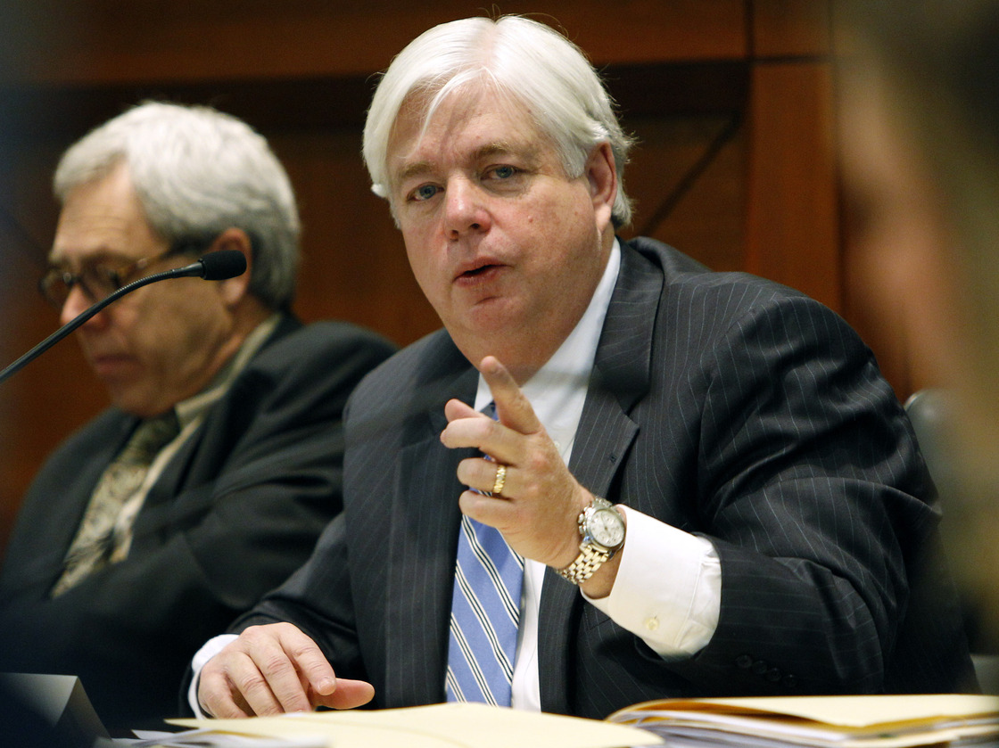 Iowa Supreme Court Justice David Wiggins, right, faces a retention vote Nov. 6.