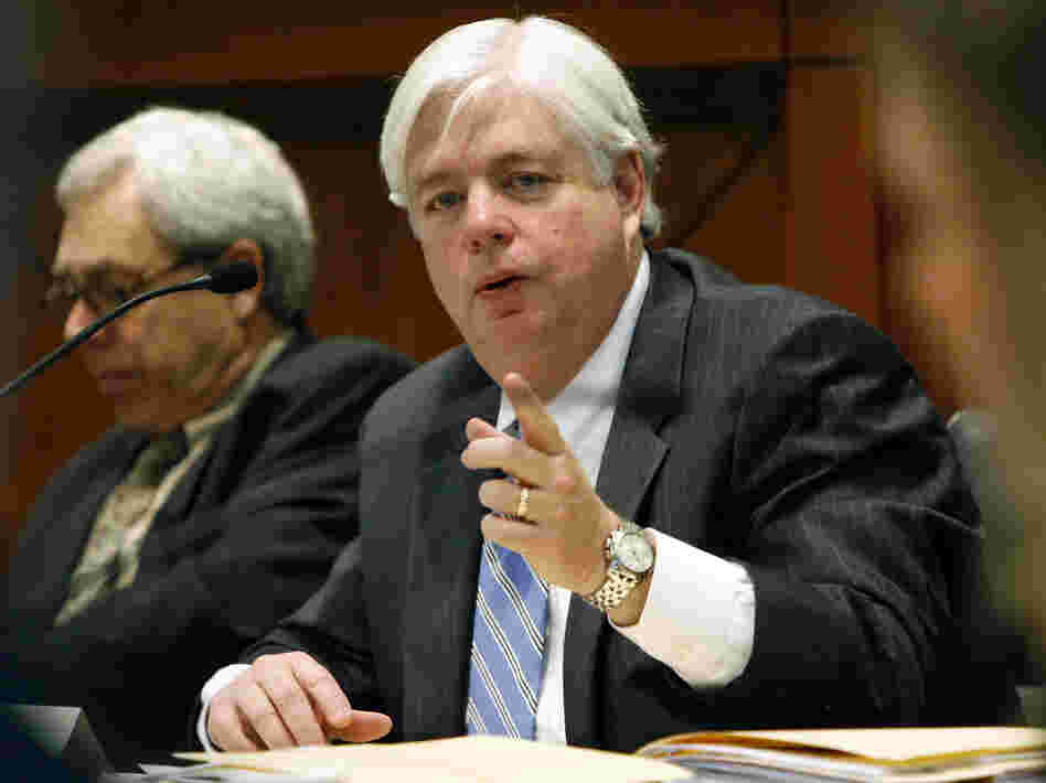 Iowa Supreme Court Justice David Wiggins, right, faces a retention vote Nov. 6.