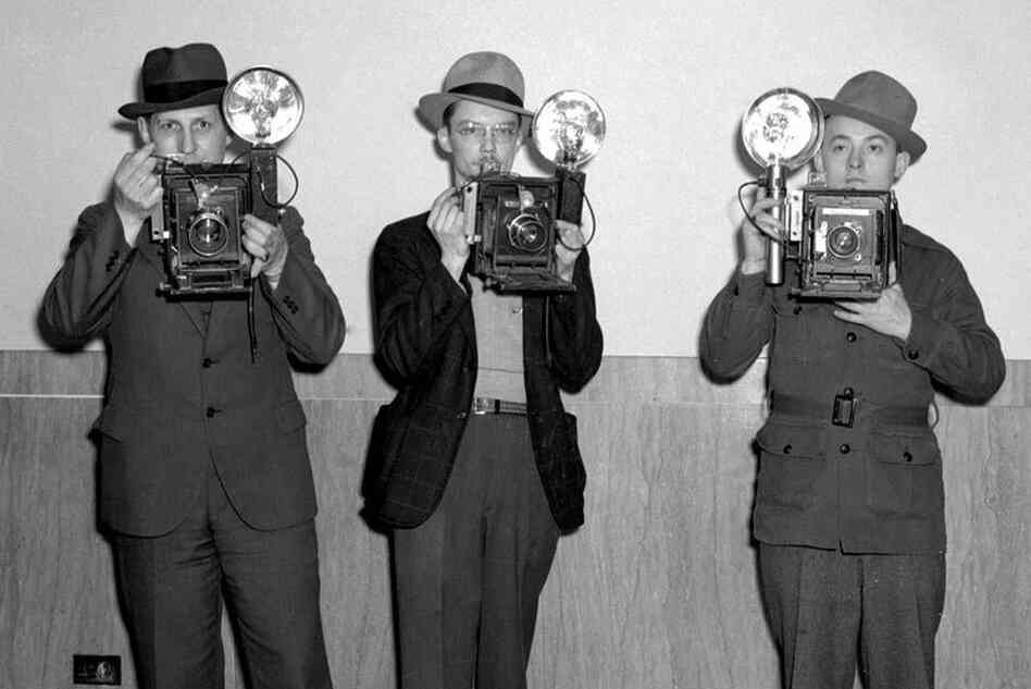 Raymond Hodde (left) was hired in 1930 and was the State Journal's first full-time staff photographer. He was joined later in the decade by Joe Imlay (center) and Charlie Bilyeu.