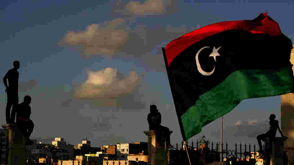 Libyans watch the protest against Ansar al-Shariah Brigades and other Islamic militias, in Benghazi on Sept. 21. The recent attack that killed the U.S. ambassador and three other Americans has sparked a backlash among frustrated Libyans against the heavily armed gunmen, including Islamic extremists, who run rampant in their cities. Libyans watch the protest against Ansar al-Shariah Brigades and other Islamic militias, in Benghazi on Sept. 21. The recent attack that killed the U.S. ambassador and three other Americans has sparked a backlash among frustrated Libyans against the heavily armed gunmen, including Islamic extremists, who run rampant in their cities.