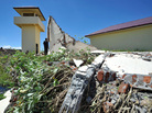 A prison official examines the damage a day after a powerful earthquake hit the west coast of Indonesia in Banda Aceh on April 12. A prison official examines the damage a day after a powerful earthquake hit the west coast of Indonesia in Banda Aceh on April 12.