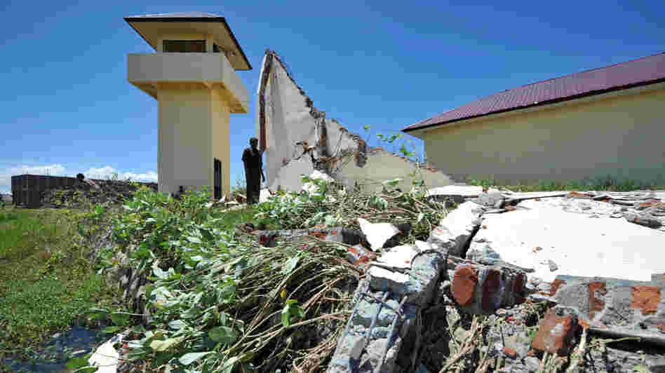 A prison official examines the damage a day after a powerful earthquake hit the west coast of Indonesia in Banda Aceh on April 12. A prison official examines the damage a day after a powerful earthquake hit the west coast of Indonesia in Banda Aceh on April 12.