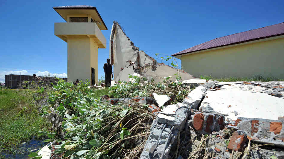 A prison official examines the damage a day after a powerful earthquake hit the west coast of Indonesia in Banda Aceh on April 12. A prison official examines the damage a day after a powerful earthquake hit the west coast of Indonesia in Banda Aceh on April 12.