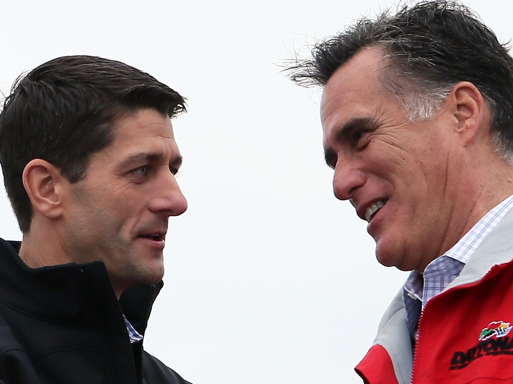 Presidential candidate Mitt Romney and his running mate, Rep. Paul Ryan, share a moment during a campaign rally in Vandalia, Ohio.