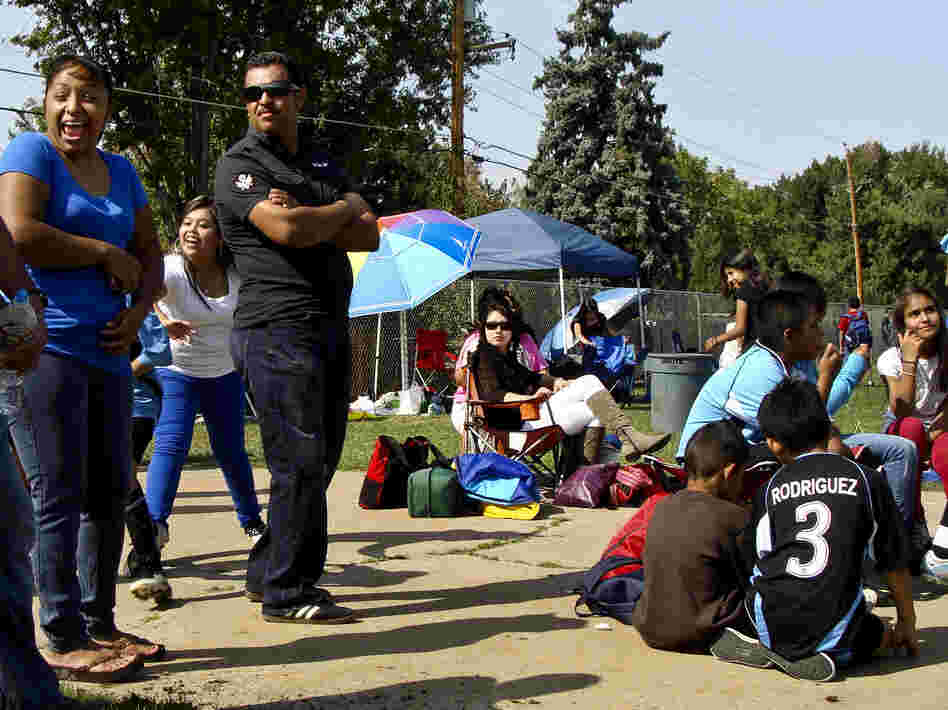 Families in a predominantly Latino youth soccer league gather for matches in Aurora. Hispanics make up nearly a third of the city's population, according to the 2010 Census.