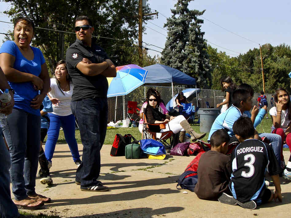 Families in a predominantly Latino youth soccer league gather for matches in Aurora. Hispanics make up nearly a third of the city's population, according to the 2010 Census.