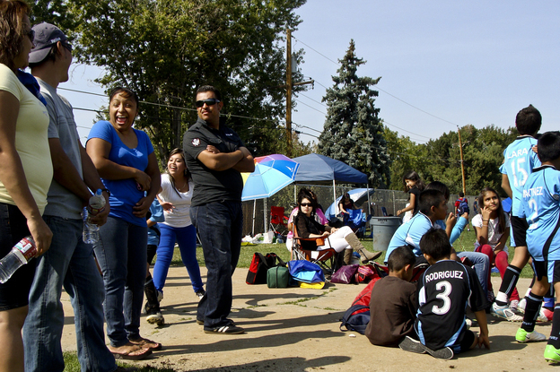Families in a predominantly Latino youth soccer league gather for matches in Aurora. Hispanics make up nearly a third of the city's population, according to the 2010 Census.
