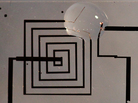 An electronic circuit in its first phases of dissolution. An electronic circuit in its first phases of dissolution.