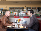 Old Joe (Bruce Willis) and his younger self (Joseph Gordon-Levitt), two iterations of the same assassin, play a particularly personal game of cat and mouse in the time-travel thriller Looper. Old Joe (Bruce Willis) and his younger self (Joseph Gordon-Levitt), two iterations of the same assassin, play a particularly personal game of cat and mouse in the time-travel thriller Looper.