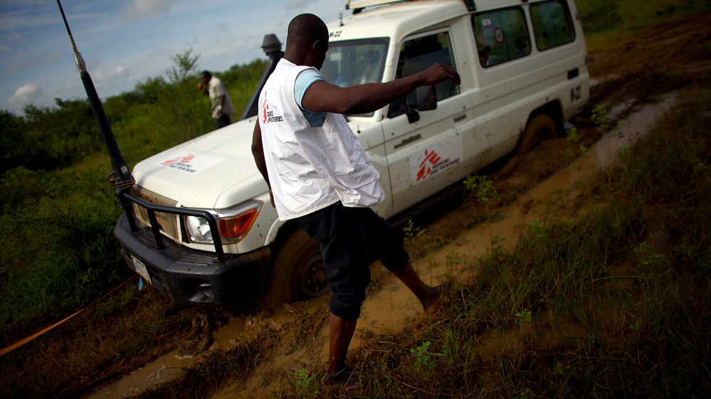 Four-wheel drive is no match for the mud on the road to a gold mine in northern Nigeria.