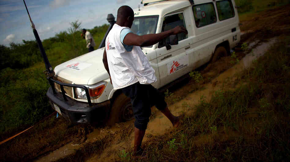Four-wheel drive is no match for the mud on the road to a gold mine in northern Nigeria.