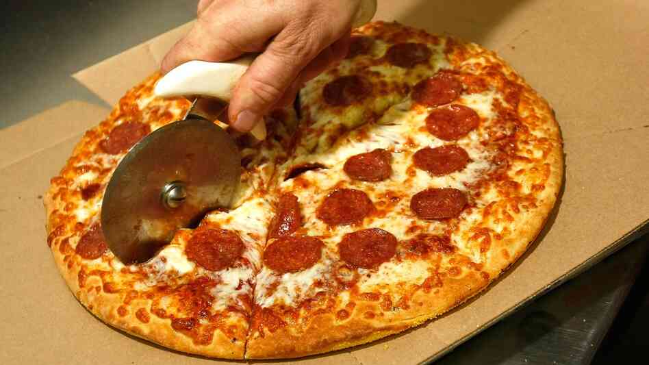 Cheese that was smuggled into Canada may have brought profits of more than $165,000, according to police. Pizzerias were reportedly a main market for the criminals, who were arrested this week.