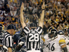 They'll be welcomed back by fans: Regular NFL refs will be on the job again starting tonight. (2006 file photo.) They'll be welcomed back by fans: Regular NFL refs will be on the job again starting tonight. (2006 file photo.)