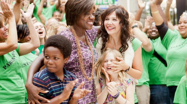 Nona Alberts (Viola Davis) and Jamie Fitzpatrick (Maggie Gyllenhaal) share a triumphant moment with Nona's son Cody (Dante Brown) and Jamie's daughter Malia (Emily Alyn Lind).