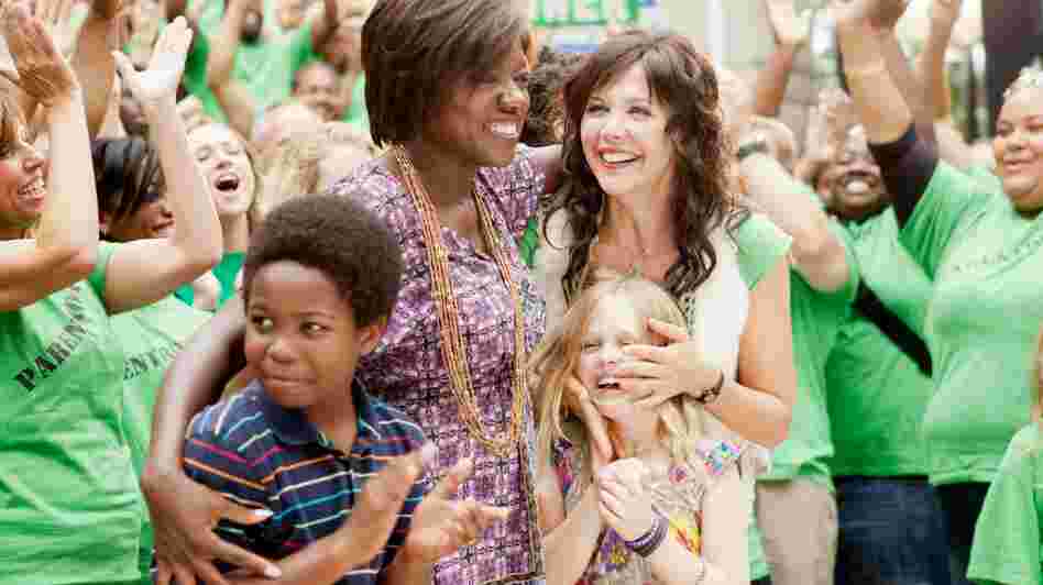 Nona Alberts (Viola Davis) and Jamie Fitzpatrick (Maggie Gyllenhaal) share a triumphant moment with Nona's son Cody (Dante Brown) and Jamie's daughter Malia (Emily Alyn Lind).