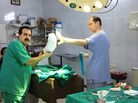 Local Syrian doctors prepare to treat a patient in a field hospital in Aldana, Syria, near the Turkish border. Each day, local and expatriate doctors take big risks to treat the wounded in rebel-held areas. Local Syrian doctors prepare to treat a patient in a field hospital in Aldana, Syria, near the Turkish border. Each day, local and expatriate doctors take big risks to treat the wounded in rebel-held areas.