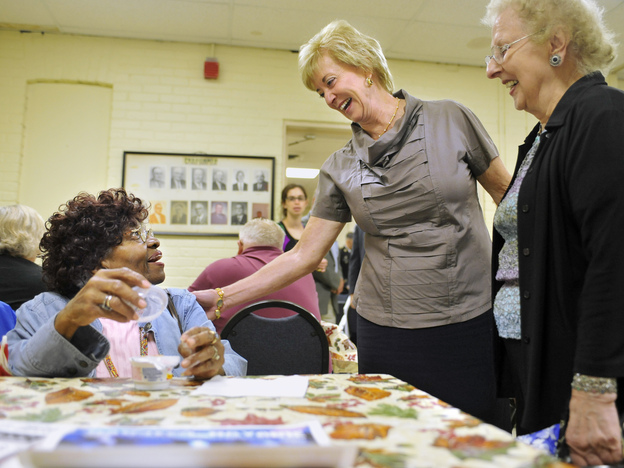 Linda McMahon (center) visits a senior center in Naugatuck, Conn., this month.