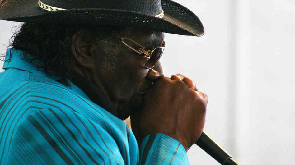 Mississippi-born harmonica player Big George Brock performs at the Philadelphia Folk Festival.