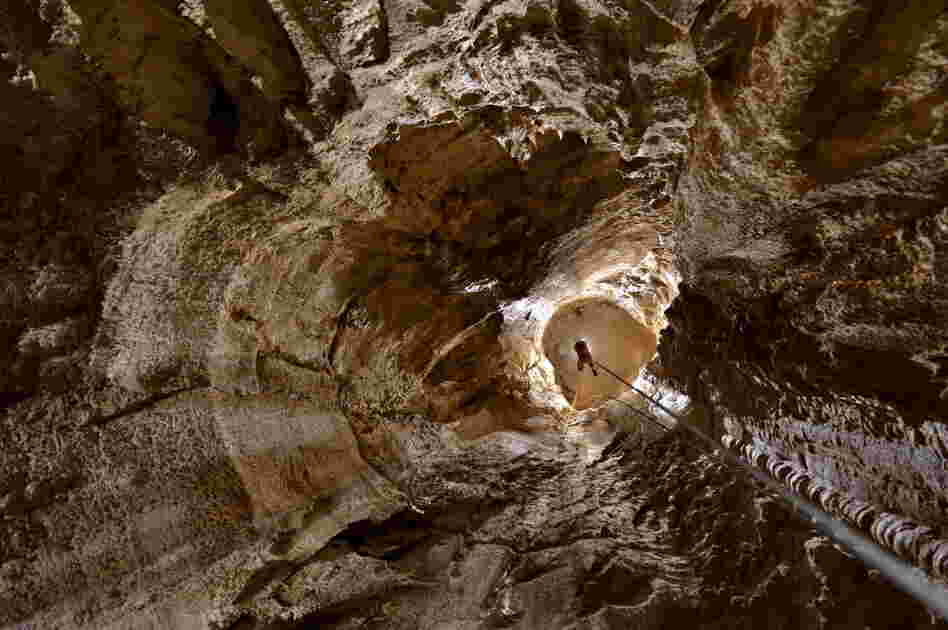 Looking down Puits Garby at caver Adam Spillane.