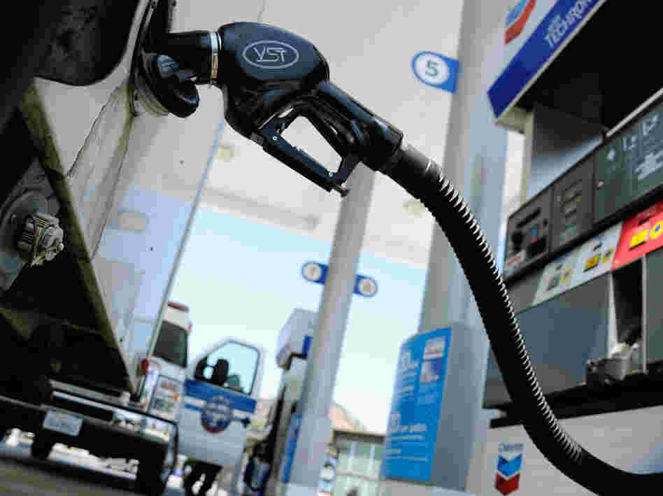 Higher prices at the pump meant the amount of money consumers spent went up last month.