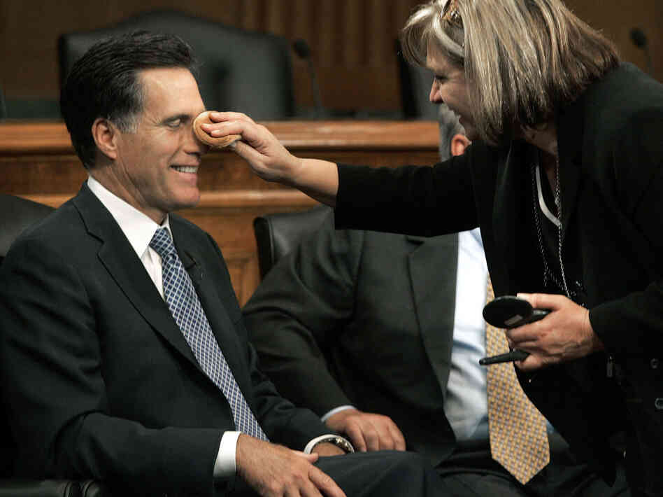 Mitt Romney has makeup applied before a discussion on Capitol Hill on Sept. 14, 2005.