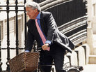British Cabinet Minister Andrew Mitchell is accused of denigrating a police officer during an altercation over his bicycle. British Cabinet Minister Andrew Mitchell is accused of denigrating a police officer during an altercation over his bicycle.