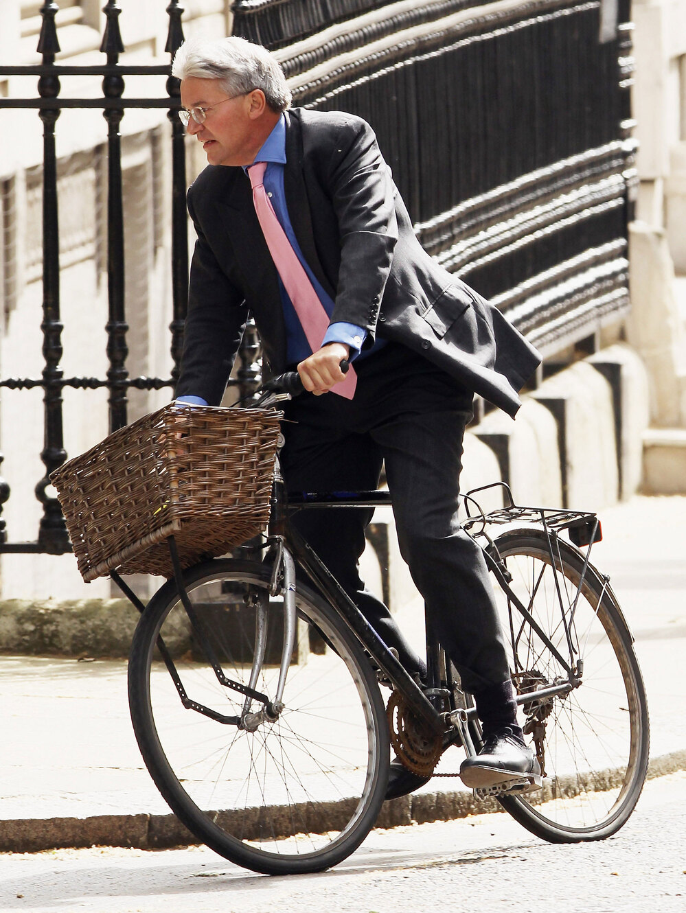 British Cabinet Minister Andrew Mitchell is accused of denigrating a police officer during an altercation over his bicycle.
