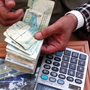 A money-changer in the Afghan city of Herat counts a stack of Iranian bills. More and more Iranian currency is being brought in by smugglers to exchange for dollars, which then go back to Iran. A money-changer in the Afghan city of Herat counts a stack of Iranian bills. More and more Iranian currency is being brought in by smugglers to exchange for dollars, which then go back to Iran.